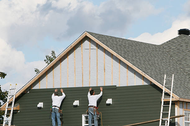 Professional Siding Contractor technician working in Creekside, PA